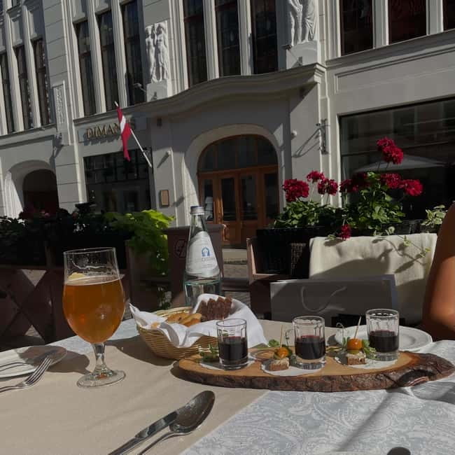 Flavours of Riga: Food, History & Hidden Gems Tour - Old Town streets between the tastings