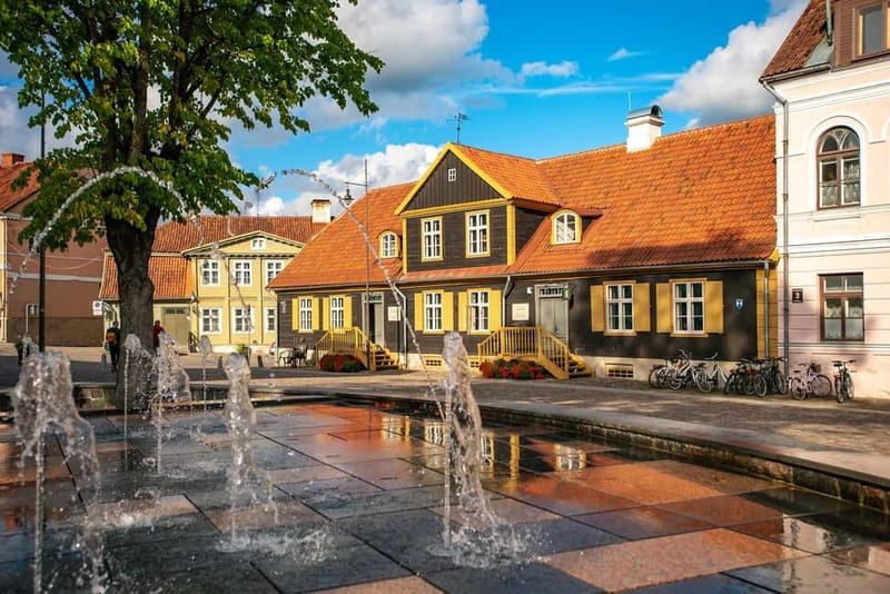 From Riga: Kuldiga UNESCO, Waterfall & Wine Day Trip - The two-hour ride west from Riga