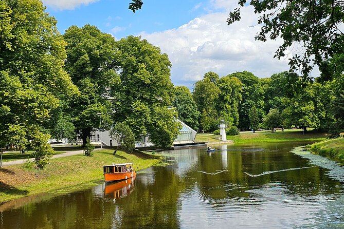 Riga Canal and Daugava Boat Tour with Welcome Drink & Audio Guide - Starting at Andrejosta Marina