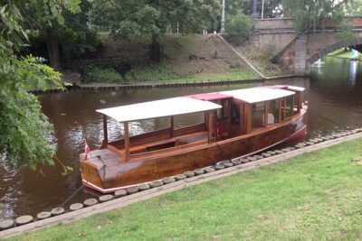 Riga Canal and Daugava Boat Tour with Welcome Drink & Audio Guide