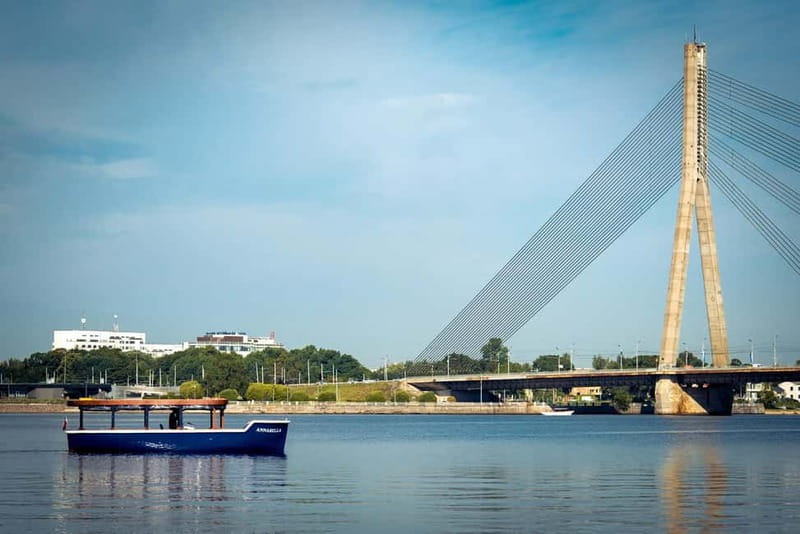 Riga: Canal and River Daugava Sightseeing Cruise - Central Market, the railway bridge, and Riga’s working side