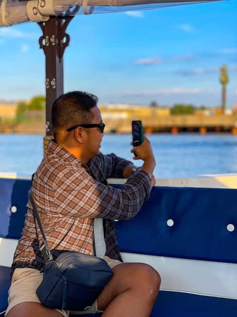 Riga: Canal Boat Sightseeing Tour With Audio guide - The Audio Guide and Help From the Captain