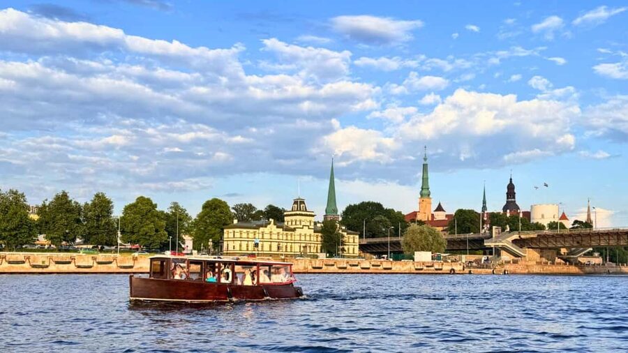 Riga: Canal Boat Tour with Welcome Drink & Audio Guide - Setting off through the Riga Canal