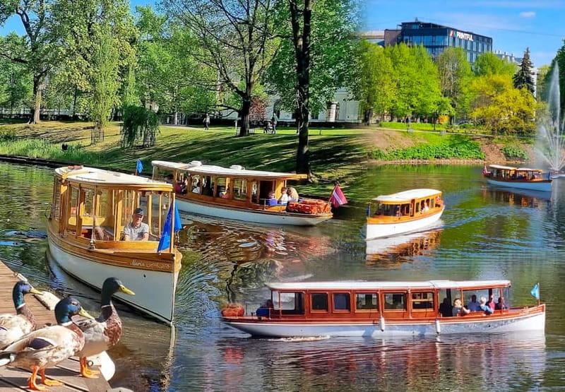 Riga: Canal & Daugava Cruise on a Historic Wooden Boat - The wooden boat, seating, and onboard commentary
