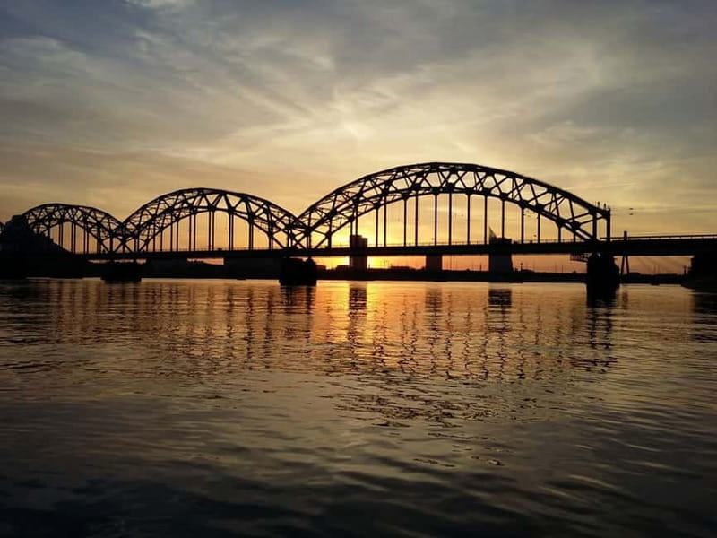 Riga: Canal & Daugava Cruise on a Historic Wooden Boat - Boarding beside the Freedom Monument