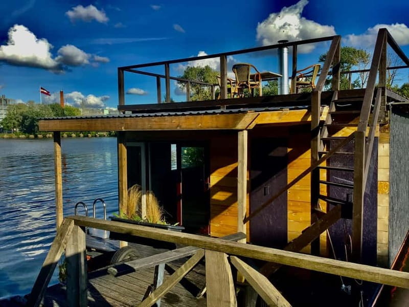 Riga: Floating Sauna Experience on the Daugava River - Inside the sauna: warm wood and a wood stove