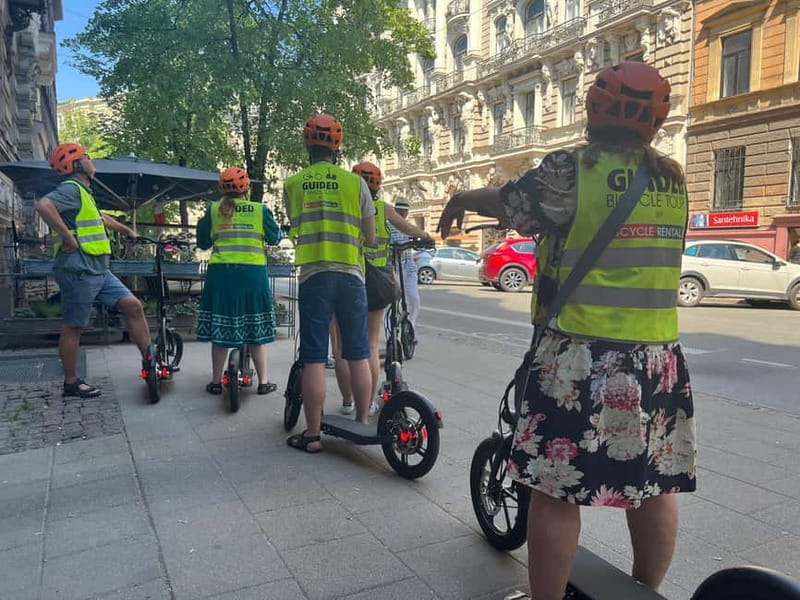 Riga Highlight Big wheel e-scooter Group or Private tour - Reaching the Art Nouveau district