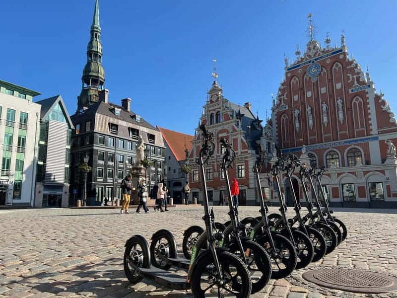 Riga Highlight Big wheel e-scooter Group or Private tour - The guide system makes a real difference