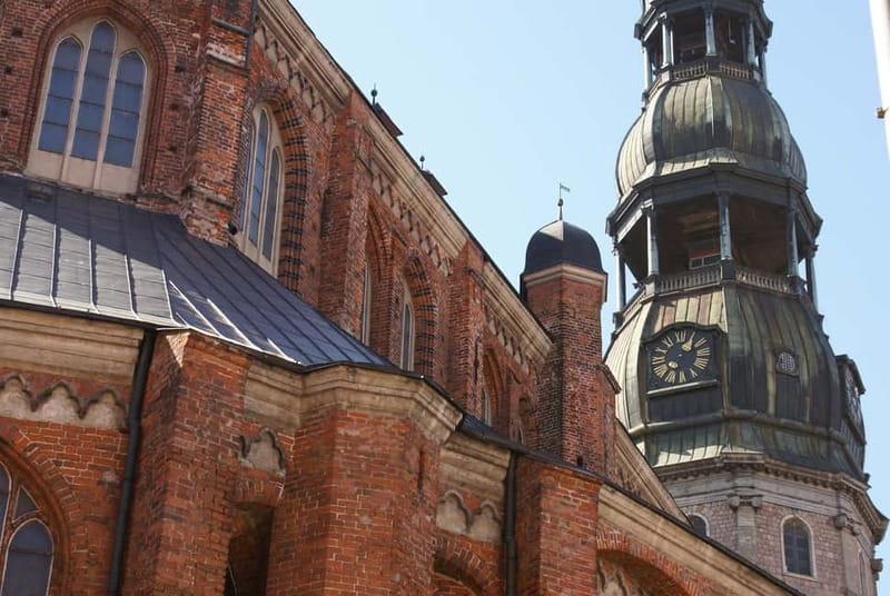 Riga: Old Town Walking Tour in a Small Group or Private - Līvu Square, guild houses, and changing styles