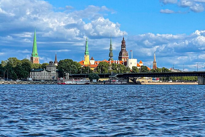 Riga Sightseeing Tour by Canal Boat with Audioguide - The Opera and the tunnel near Stockmann