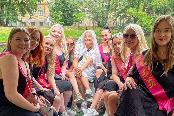Riga Sightseeing Tour by Canal Boat with Audioguide - Kipsala, Vansu Bridge, and the old harbor